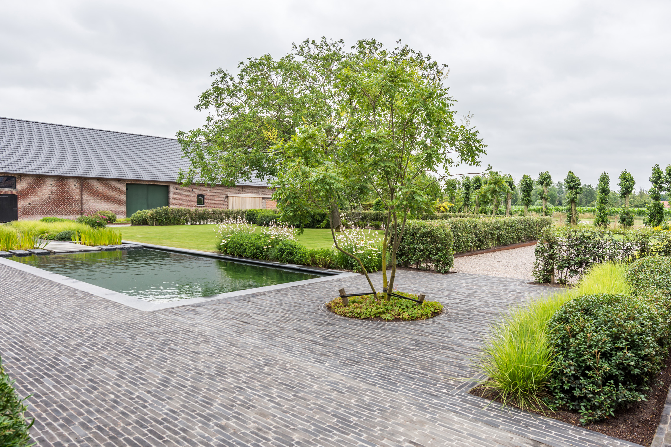 Tuin in hoevestijl met tijdloos karakter om ‘tijdloos’ te genieten